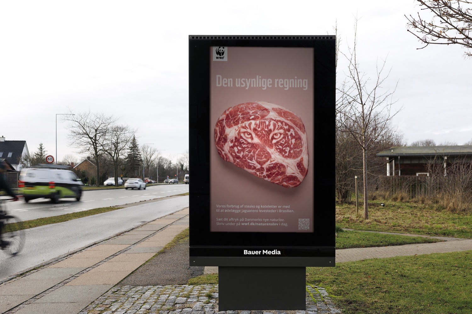 Den usynlige regning på en reklamesøjle ved vejen